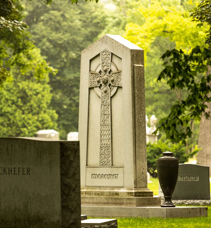 Monument-style gravestone with Celtic cross