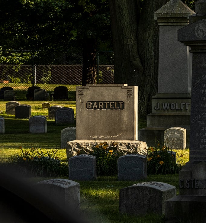 Photo of a raised headstone with the name 