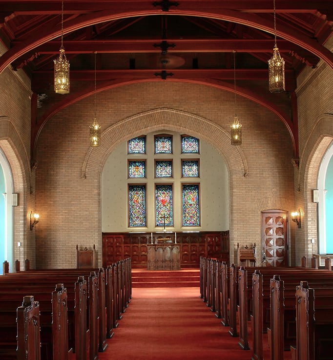Interior photo of chapel with stained glass windows